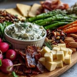 Fresh and colorful charcuterie featuring spring radishes, snap peas, and a creamy herb dip for gatherings.  