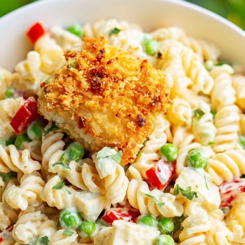 Flavorful Crispy Chicken Ranch Pasta Salad with diced red bell pepper and green onions for a refreshing crunch.